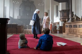Sister Veronica (REBECCA GETHINGS) and Shelagh Turner (LAURA MAIN) find two young boys abandoned in a church in Call the Midwife season 13