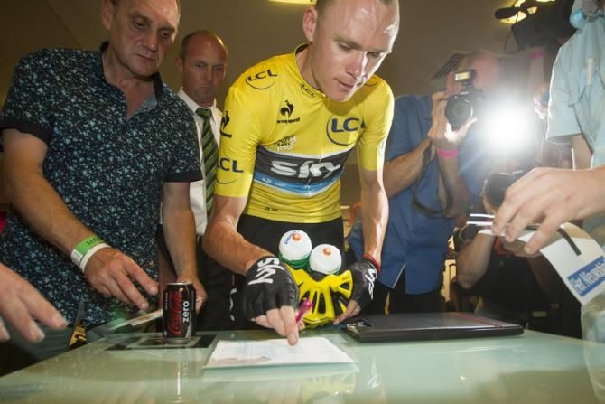 Chris Froome (Sky) signs the start list