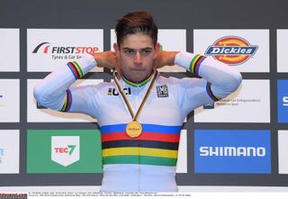 Wout Van Aert (Belgium) takes a third straight rainbow jersey