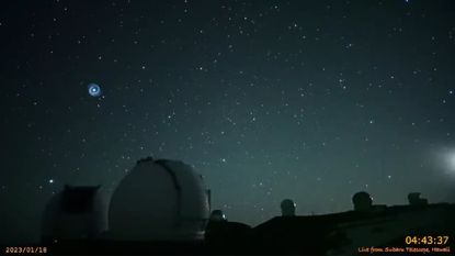 A shot of the spiral-shaped light in the sky above Hawaii captured Jan. 18 by the Subaru-Asahi Star Camera on Mauna Kea. 