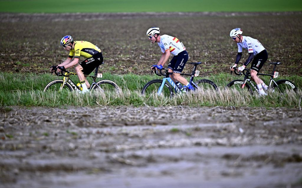 Team Visma-Lease a Bike's Belgian cyclist Wout van Aert (L) competes during the Kuurne-Brussels-Kuurne one day cycling race, 196,4 km from Kuurne to Kuurne via Brussels, in Kortrijk on February 25, 2024. (Photo by JASPER JACOBS / Belga / AFP) / Belgium OUT