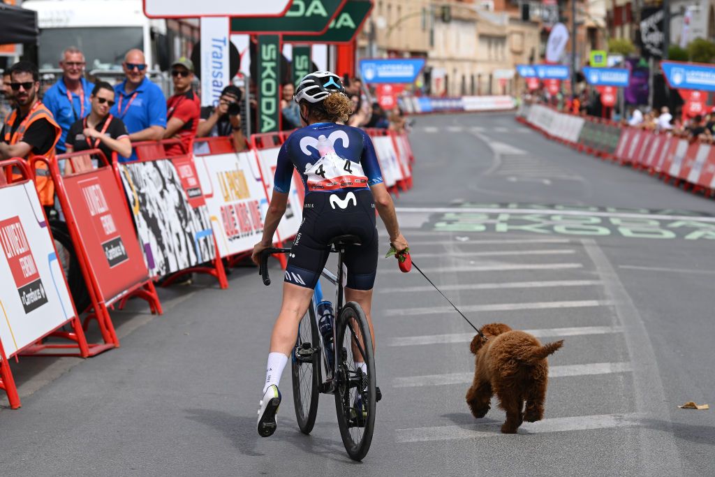LA RODA SPAIN MAY 03 Floortje Mackaij of The Netherlands and Movistar Team and her dog after the 9th La Vuelta Femenina 2023 Stage 3 a 1578km stage from Elche de la Sierra to La Roda UCIWWT on May 03 2023 in La Roda Spain Photo by Dario BelingheriGetty Images