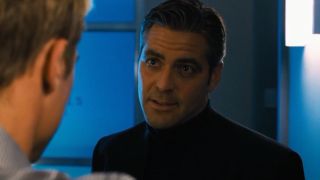 George Clooney in a dark room in Ocean's Eleven.