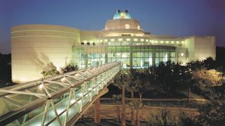 Orlando Science Center reimagines iconic dome theater with Christie RGB pure laser projection.