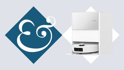 Dreame Aqua10 Roller in cleaning station on tile background next to Homes & Gardens '&' symbol.