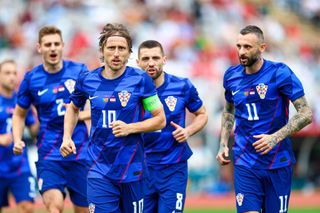 Croatia Euro 2024 squad Luka Modric of Croatia celebrates after scoring his team's first goal during the International Friendly match between Portugal and Croatia at Estadio Nacional do Jamor on June 08, 2024 in Lisbon, Portugal. (Photo by Diogo Cardoso/Getty Images)