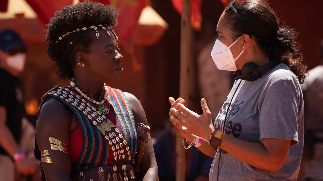Viola Davis and Gina Pince0Bythewood talking on the set of The Woman King