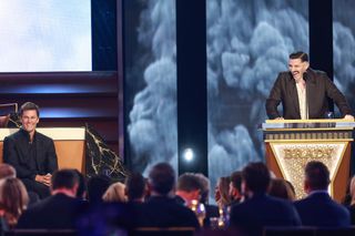 Tom Brady and Andrew Schulz speak onstage during G.R.O.A.T The Greatest Roast Of All Time: Tom Brady for the Netflix is a Joke Festival at The Kia Forum on May 05, 2024 in Inglewood, California.