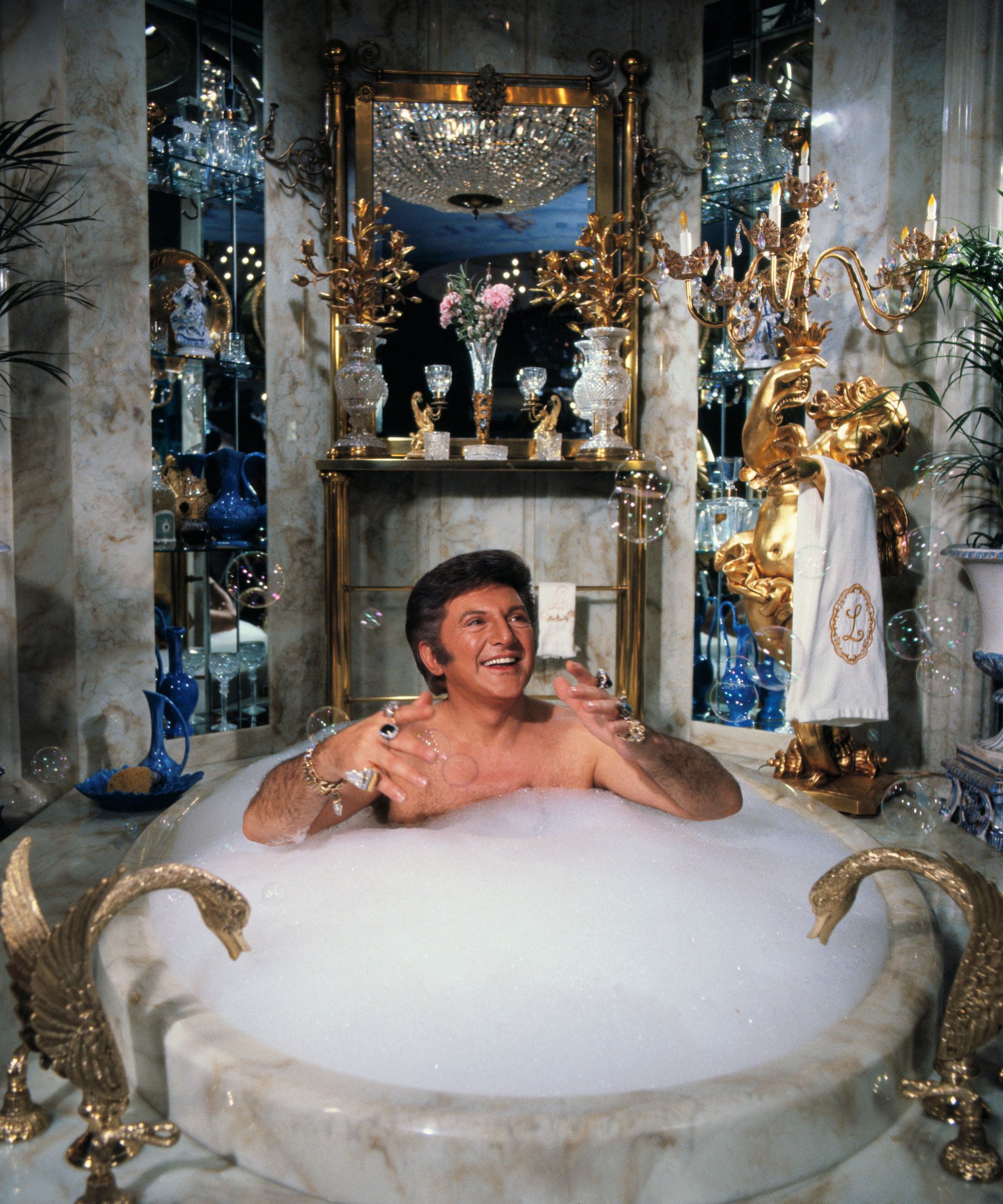 liberace in a marble bathtub