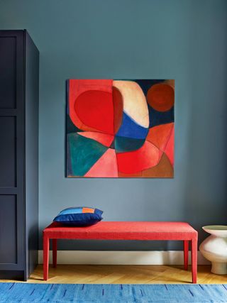 Room in Etruria by Little Greene with an abstract painting by Caroline Denervaud