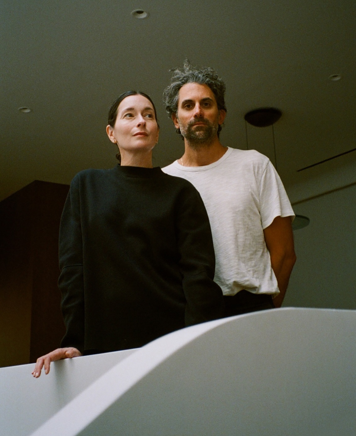 a man and a woman standing next to each other