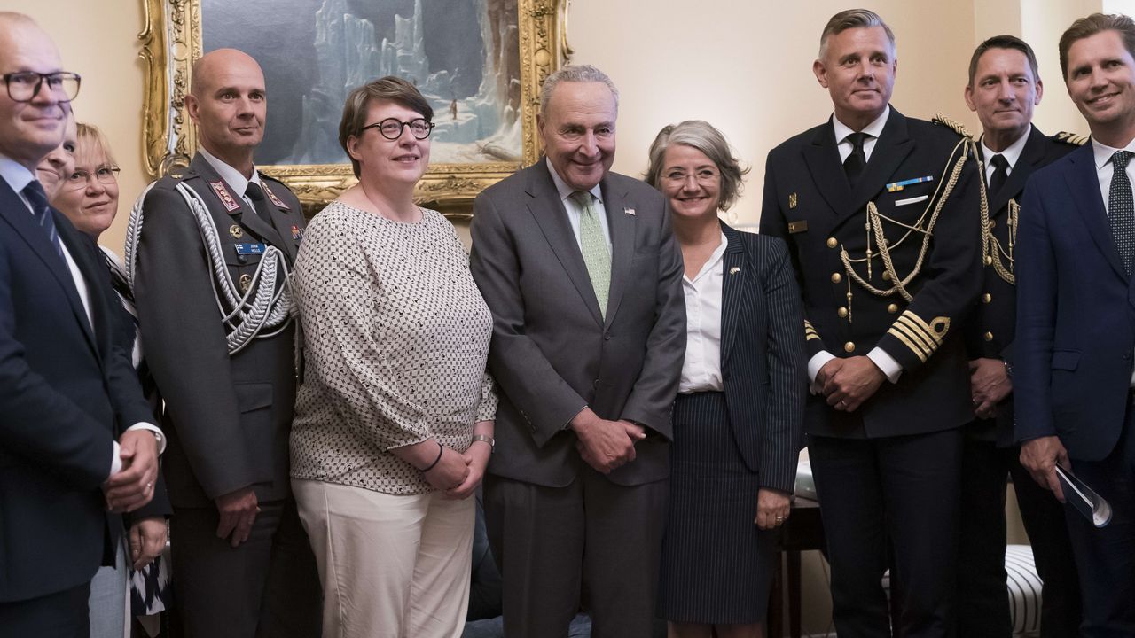 Senate Majority Leader Chuck Schumer, center, is flanked by Paivi Nevala, minister counselor of the Finnish Embassy, left, and Karin Olofsdotter, Sweden&amp;#039;s ambassador to the U.S.