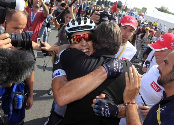 Matteo Trentin (Omega Pharma-Quick Step) gets a hug