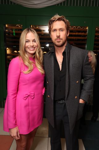 WEST HOLLYWOOD, CALIFORNIA - DECEMBER 02: (EXCLUSIVE COVERAGE) Margot Robbie (L) and Ryan Gosling at the Barbie Faber & Faber Screenplay book party at Pendry West Hollywood on December 02, 2023 in West Hollywood, California.