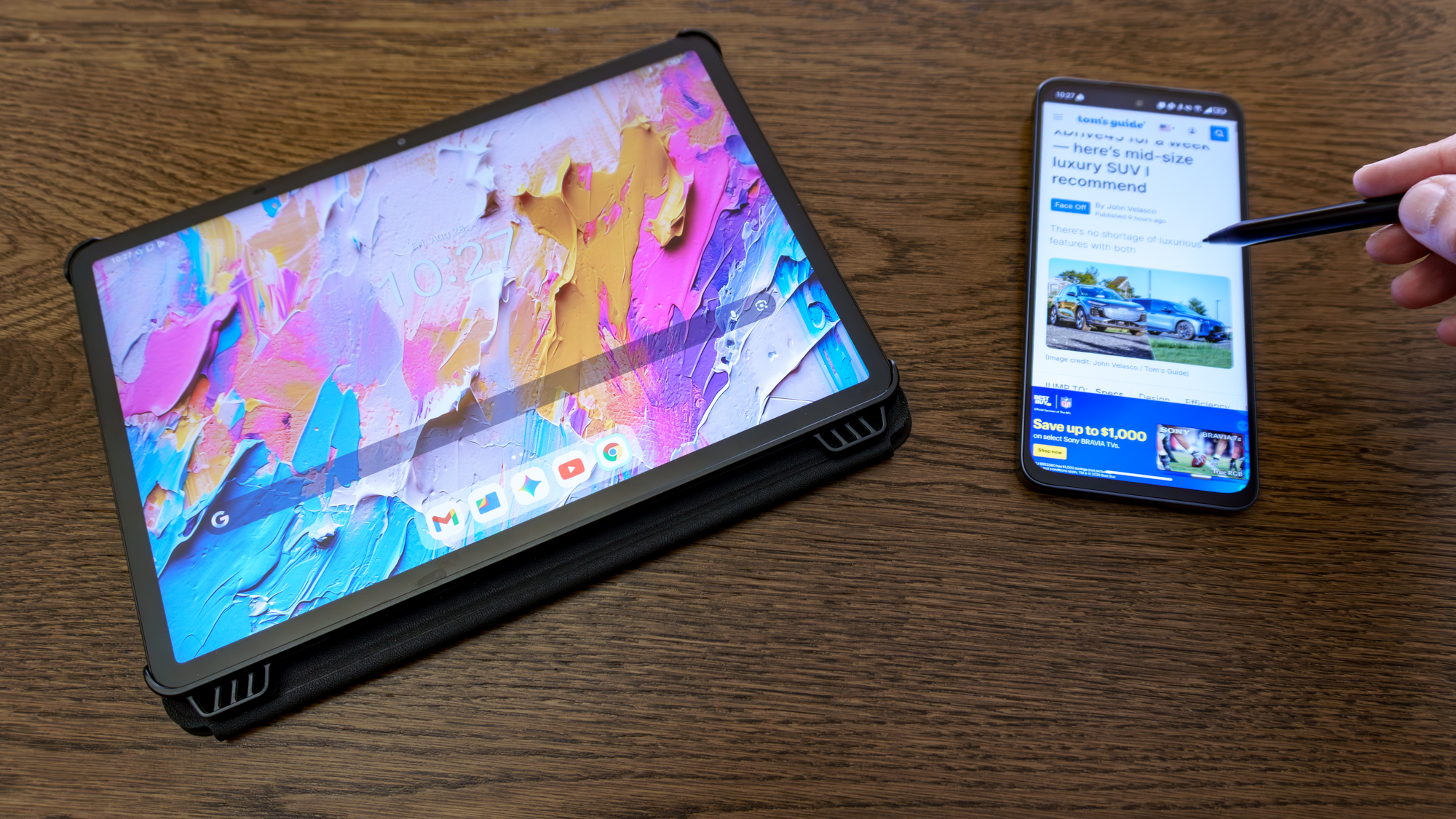 A person using the stylus from the TCL NXTPAPER 11 Plus on the TCL NXTPAPER 70 Pro