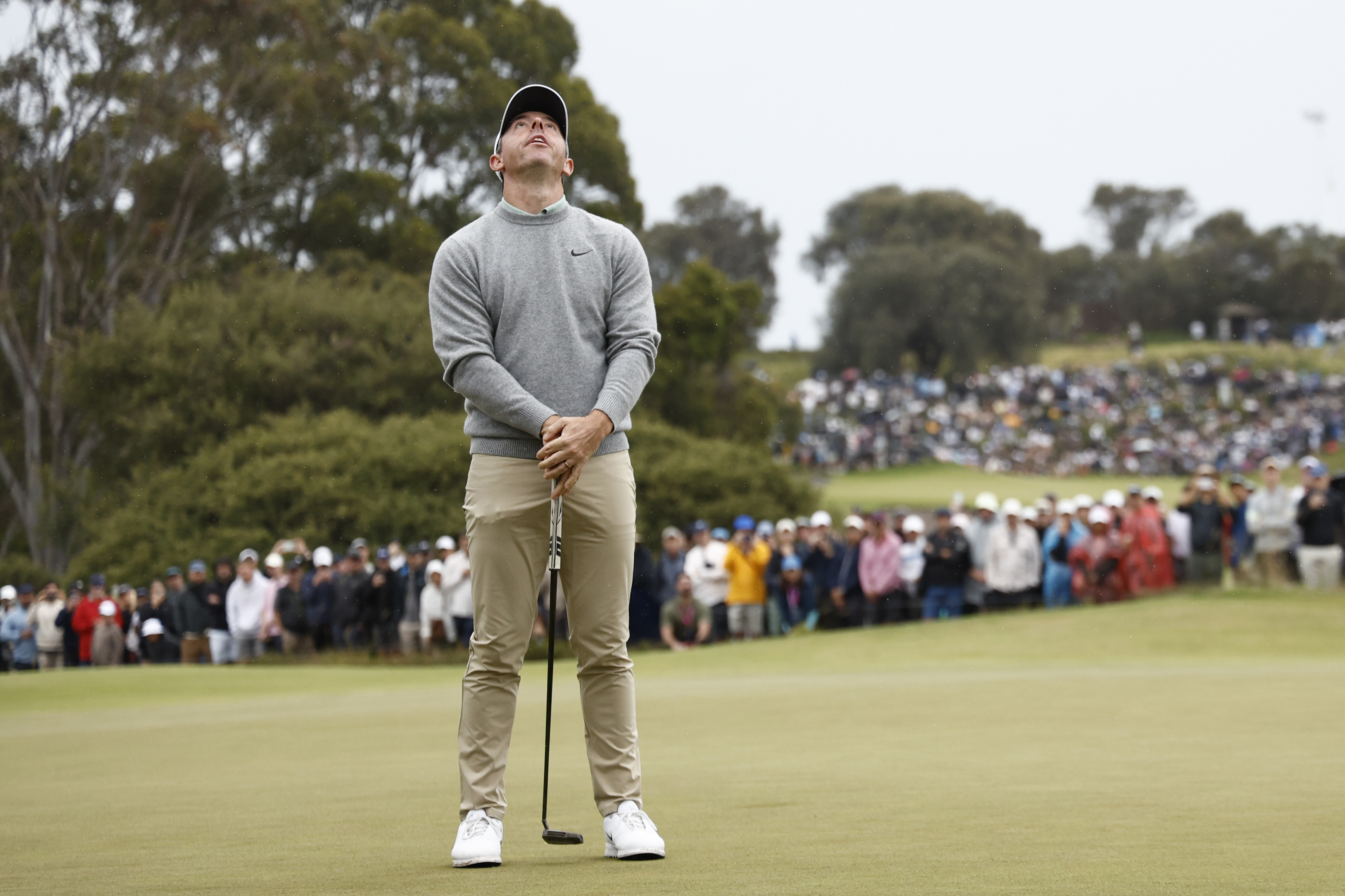 Rory McIlroy looks to the sky after missing a putt
