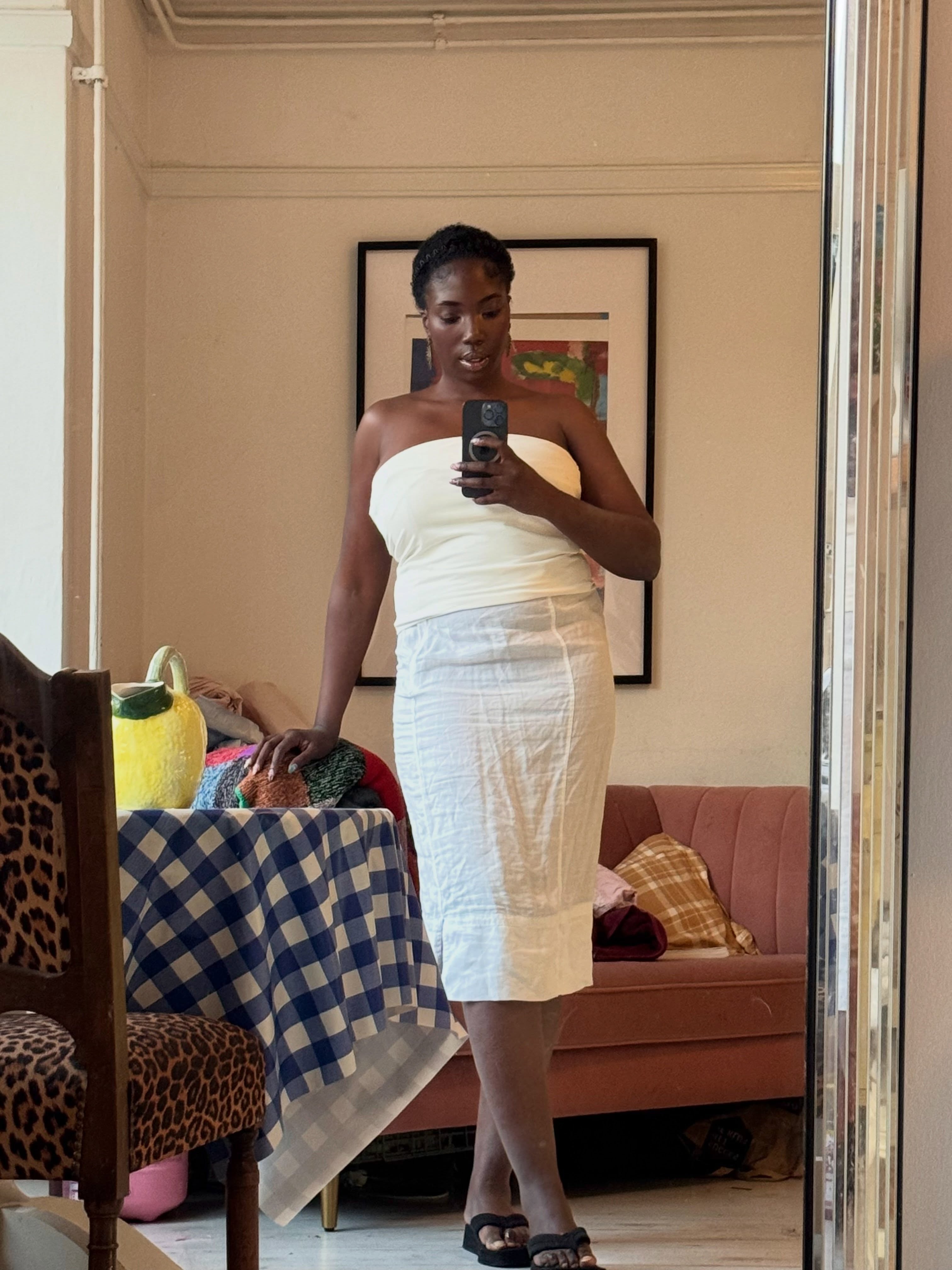 A woman wearing best white linen fashion item for summer 2026.