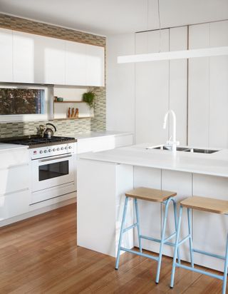 A small, all-white kitchen