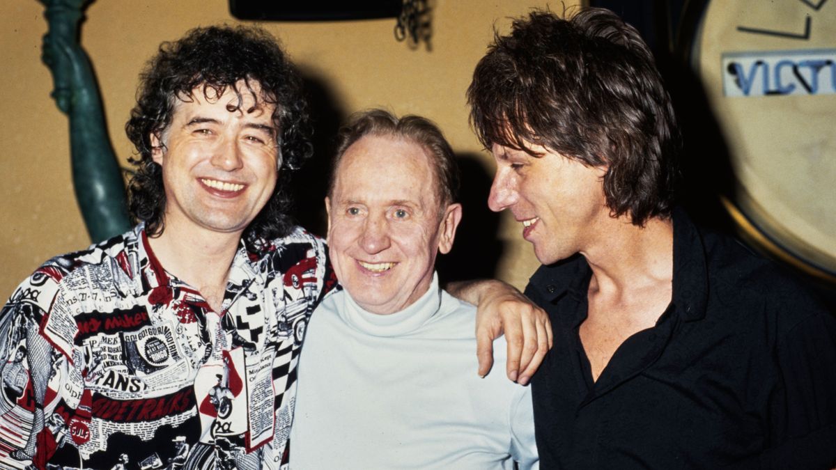 British guitarist and songwriter Jimmy Page with his arm around American guitarist, songwriter, and luthier Les Paul (1915-2009), with British guitarist and songwriter Jeff Beck attending an event, United States, circa 1985