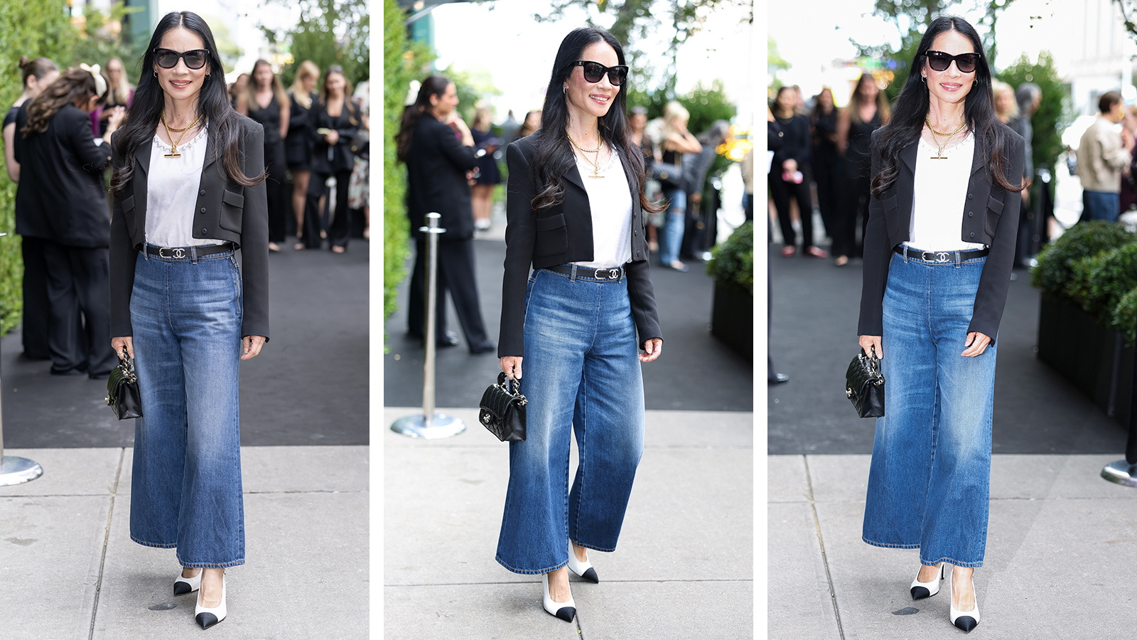 Lucy Liu wearing sunglasses, a white top, black jacket and wide leg cropped jeans