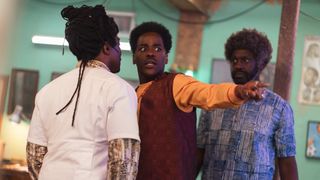 Barber, The Doctor, and Omo standing in a room in Doctor Who season 2 episode 5