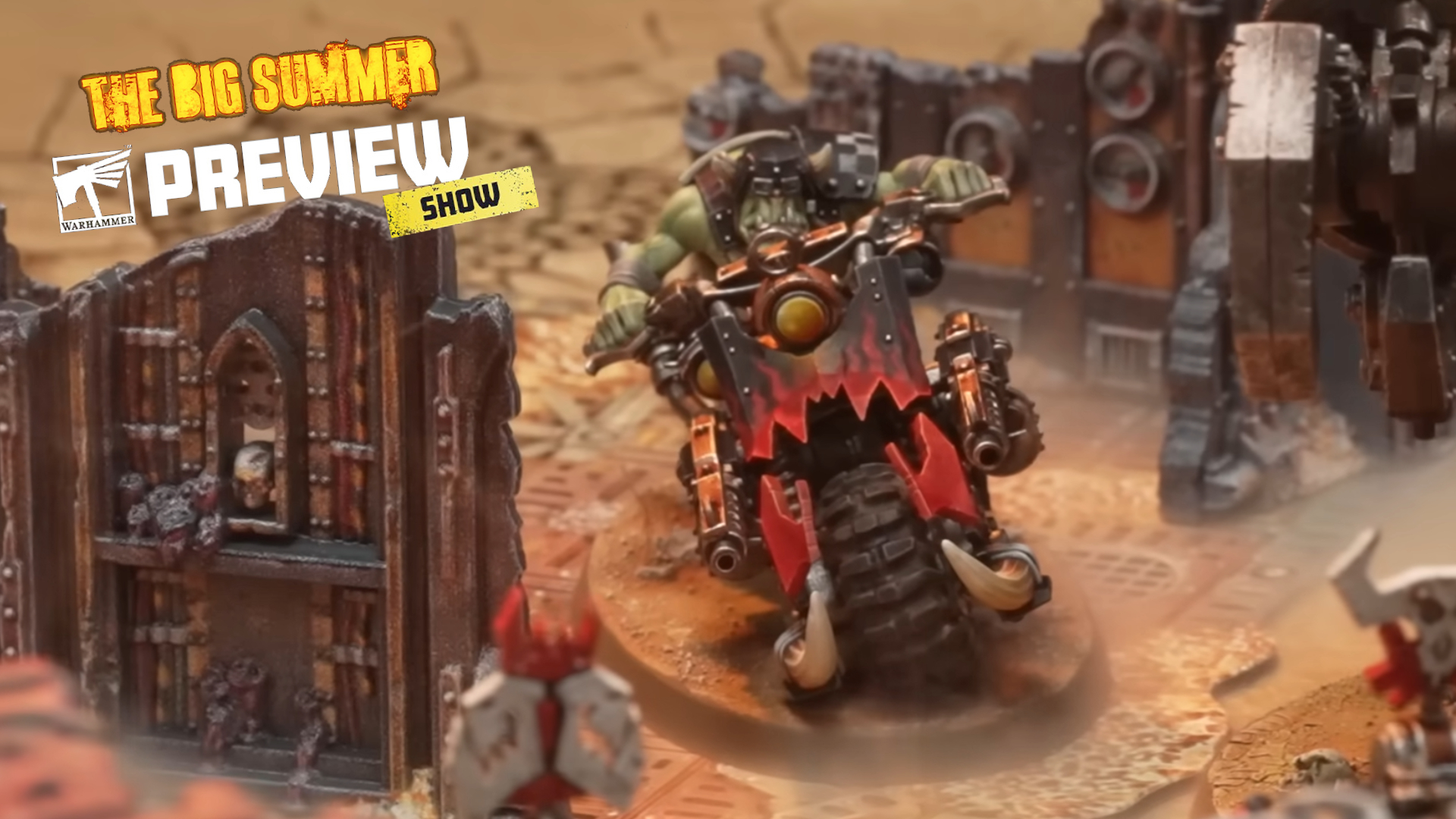 An Ork Biker weaves between ruined buildings, with the Big Summer Warhammer Preview 2026 logo in the top left-hand corner