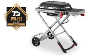 Weber Traveler portable barbecue in black and silver on a white background