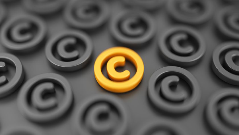 An orange copyright symbol in the middle of several gray copyright symbols