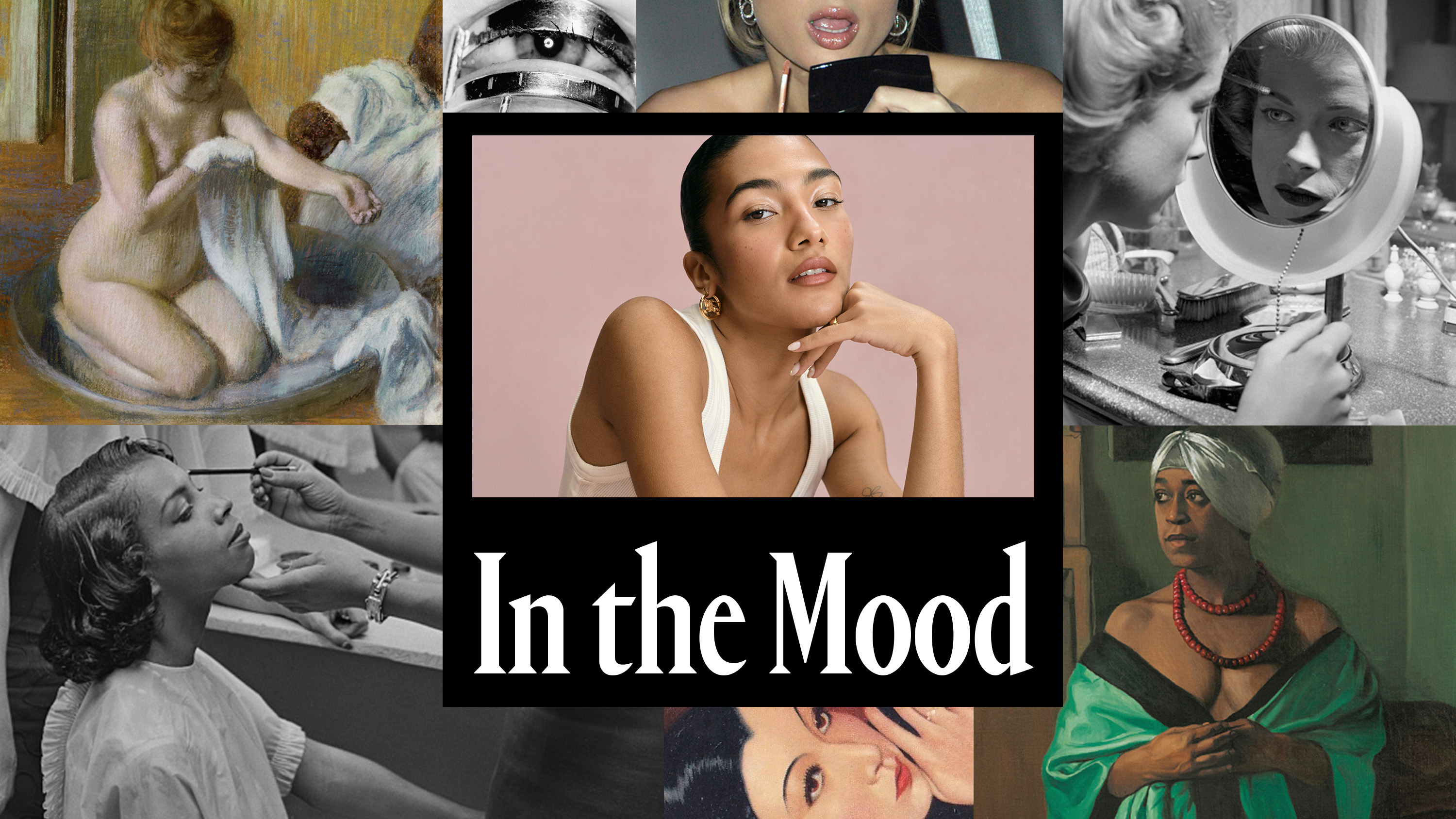 a woman with dark hair pulled back into a bun posing in front of a pink background