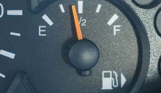 gas mileage showing half a tank — how to save gas mileage