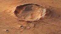 An image of a giant oval crater on Mars