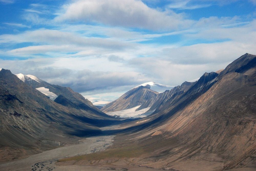 The landscape of Quttinirpaaq National Park is dominated by glaciers and sparse high-arctic tundra vegetation.