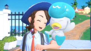 Trainer smiling with pokemon