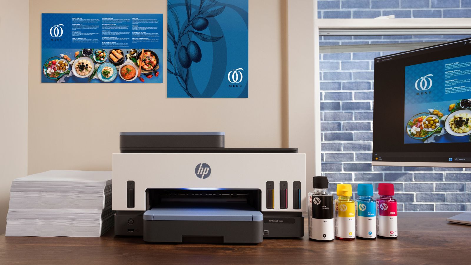 HP Smart Tank Printer with paper, ink, and business materials.