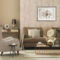 living room with rose gold feature wallpaper