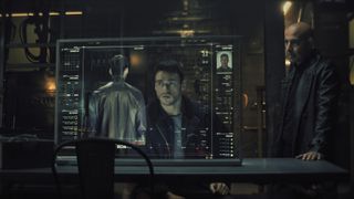 Mason Kane stares at a high-tech screen of his spy profile in Citadel