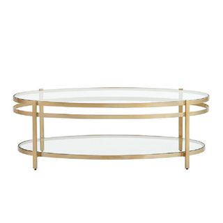 An oval glass top coffee table