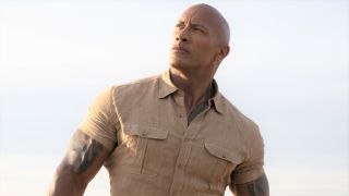 Dwayne Johnson as Dr. Bravestone looking into the distance in Jumanji: Welcome to the Jungle.