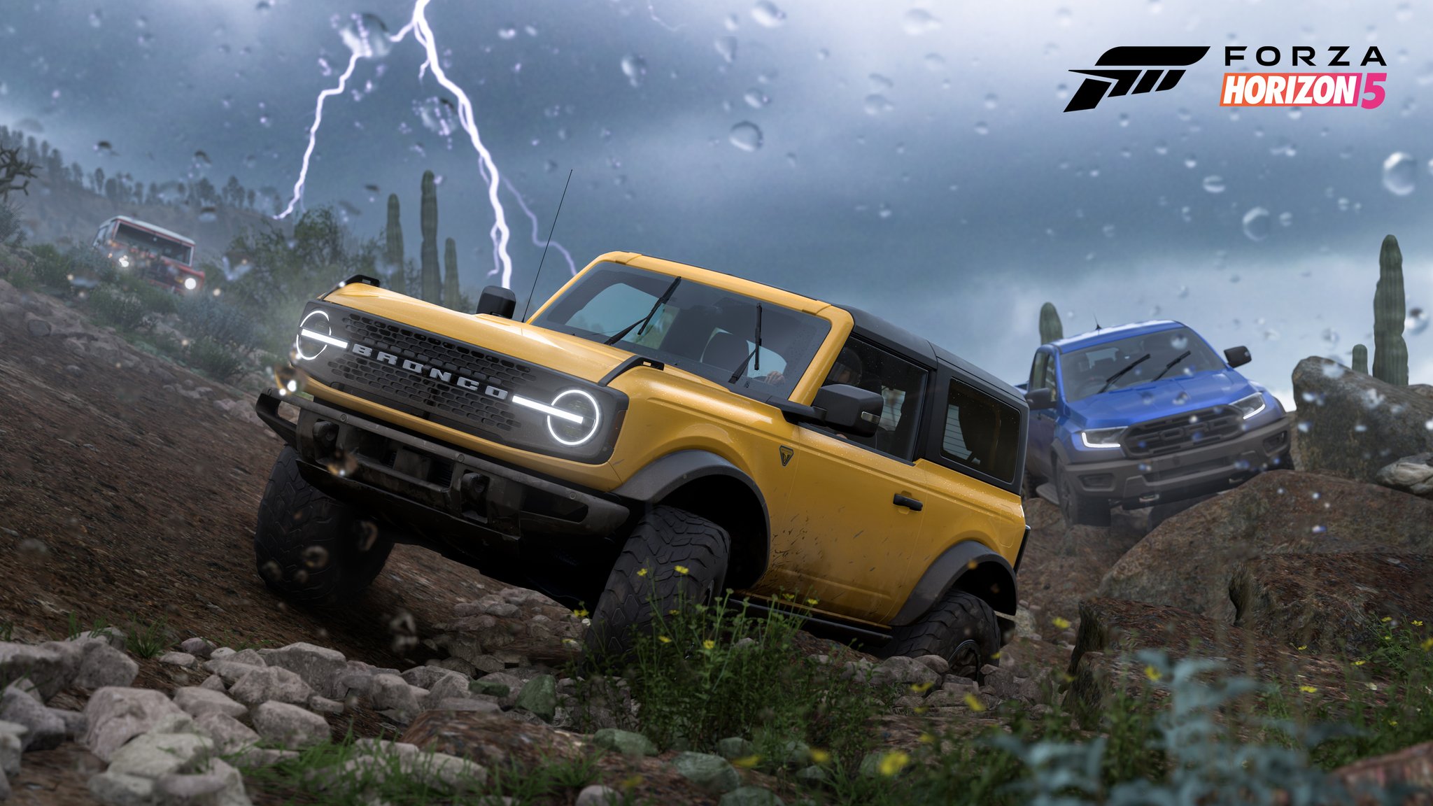 Screenshot von Forza Horizon 5 mit Autos, die während eines Sturms im Gelände unterwegs sind.
