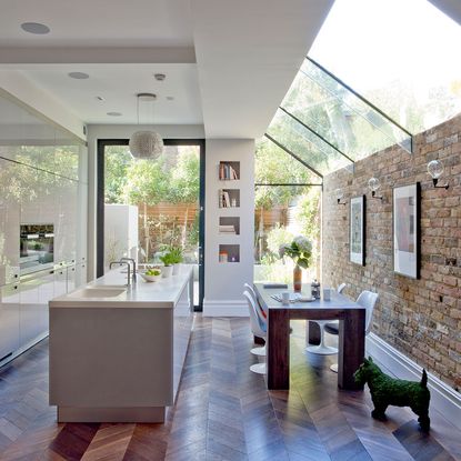 room with white walls wooden table and chair