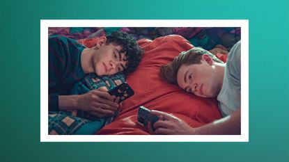 Do Nick and Charlie end up together in Heartstopper? Pictured: nick and charlie (kit connor, joe locke, respectively) on a bed playing with their phones in heartstopper season 2