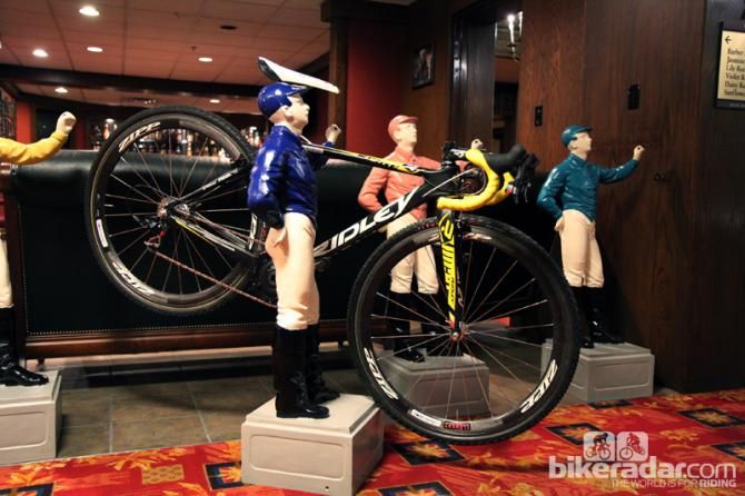 Somehow it only seemed fitting to use one of the hotel jockeys as a prop (and notice the wall of bourbon in the background). Amy's a fair bit taller than this little guy, though, and she's not a southpaw.