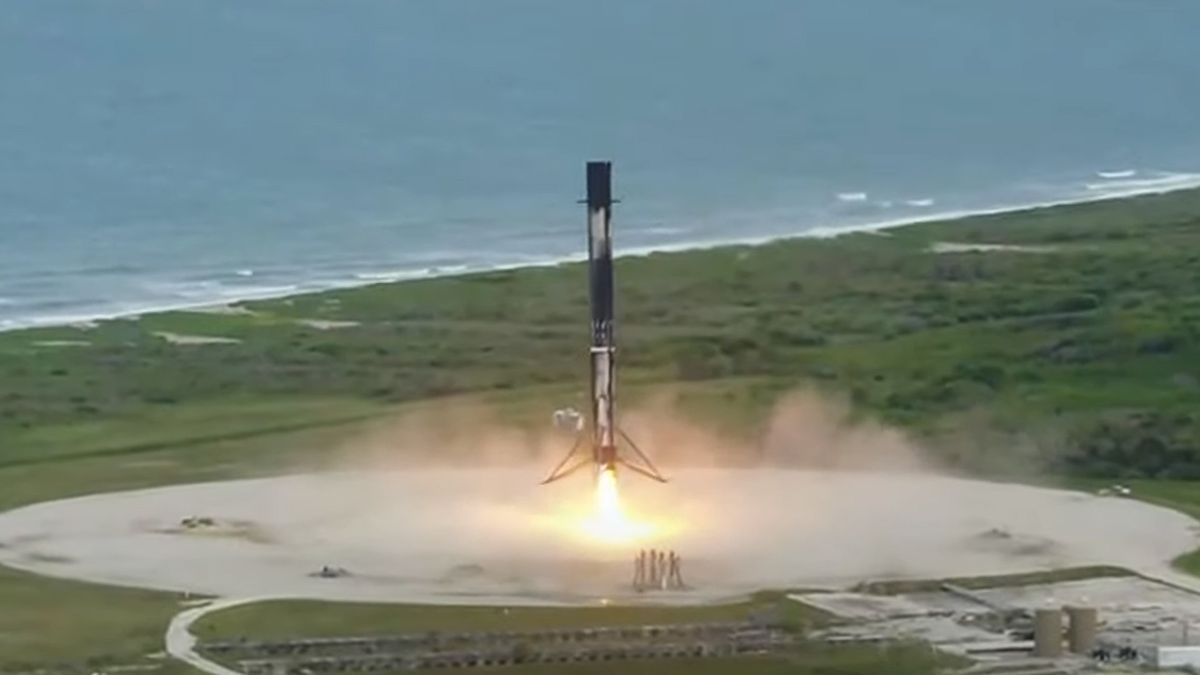 A SpaceX Falcon 9 rocket touches down at Cape Canaveral Space Force Station in Florida after launching the Transporter-2 rideshare mission to orbit, on June 30, 2021.