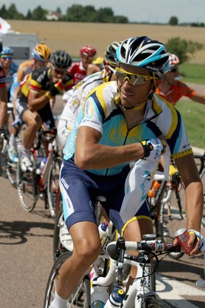 Alberto Contador (Astana) grabs a bite to eat en route to Vittel.