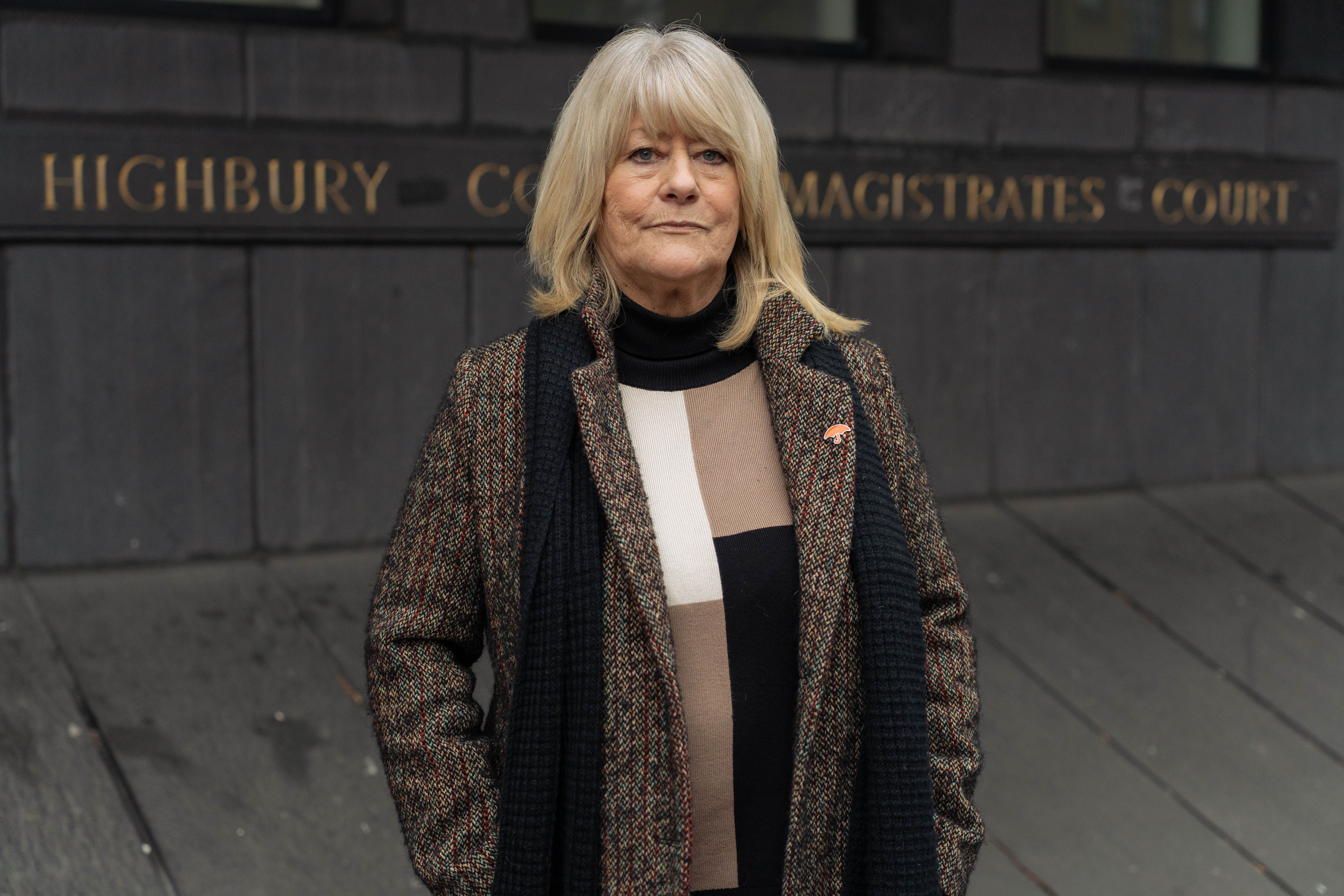 Caroline Flack's mother Christine Flack stood outside the court where her daughter was due to stand trial