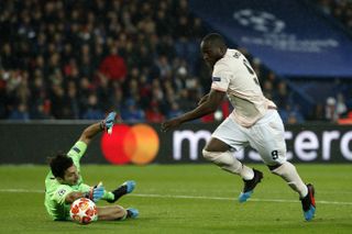 Romelu Lukaku goes round Gianluigi Buffon to score an early goal for Manchester United after Thilo Kehrer's wayward pass