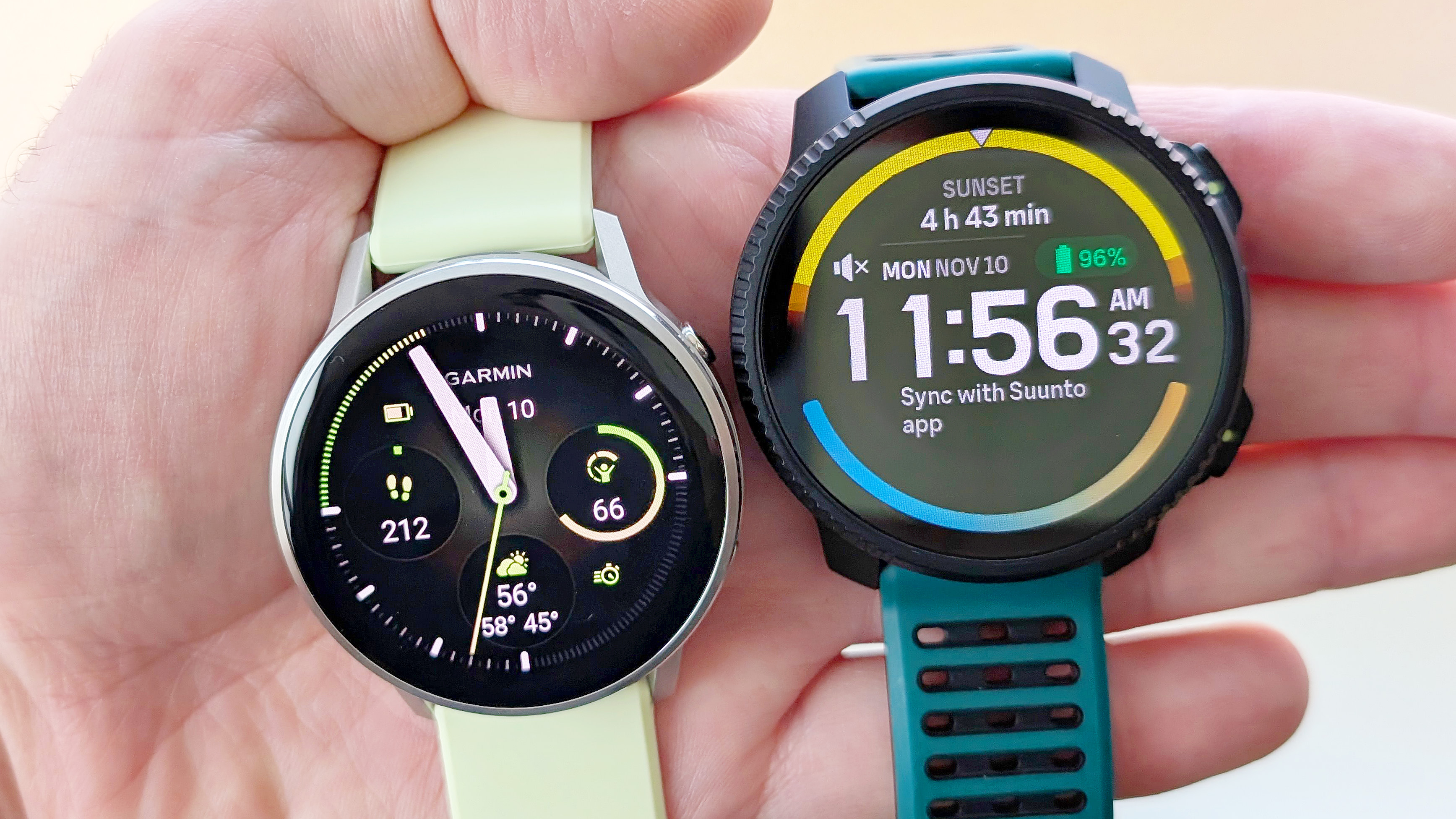 Close-up of the Garmin Venu 4 next to the Suunto Vertical 2