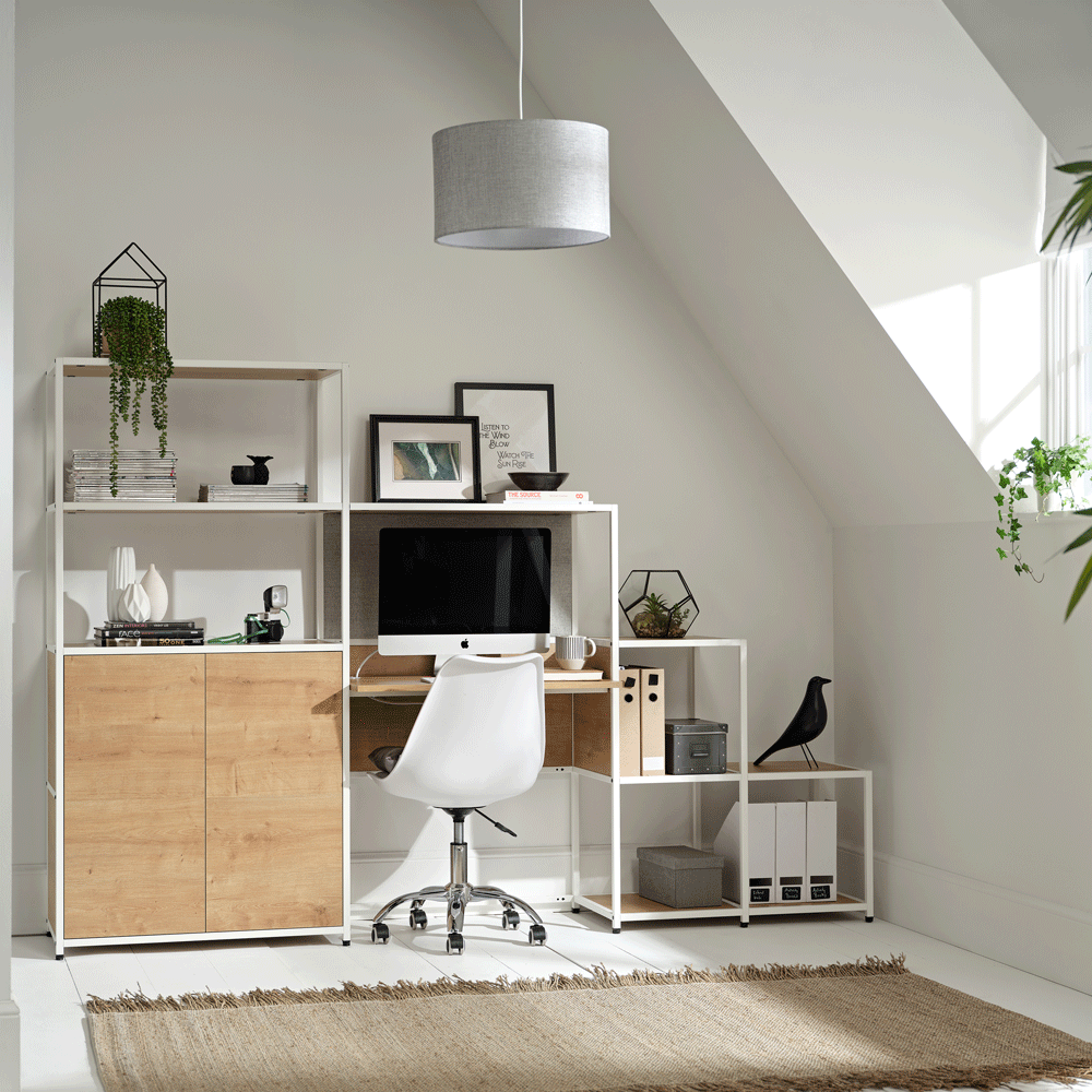 white attic room with table and hanging lamp light