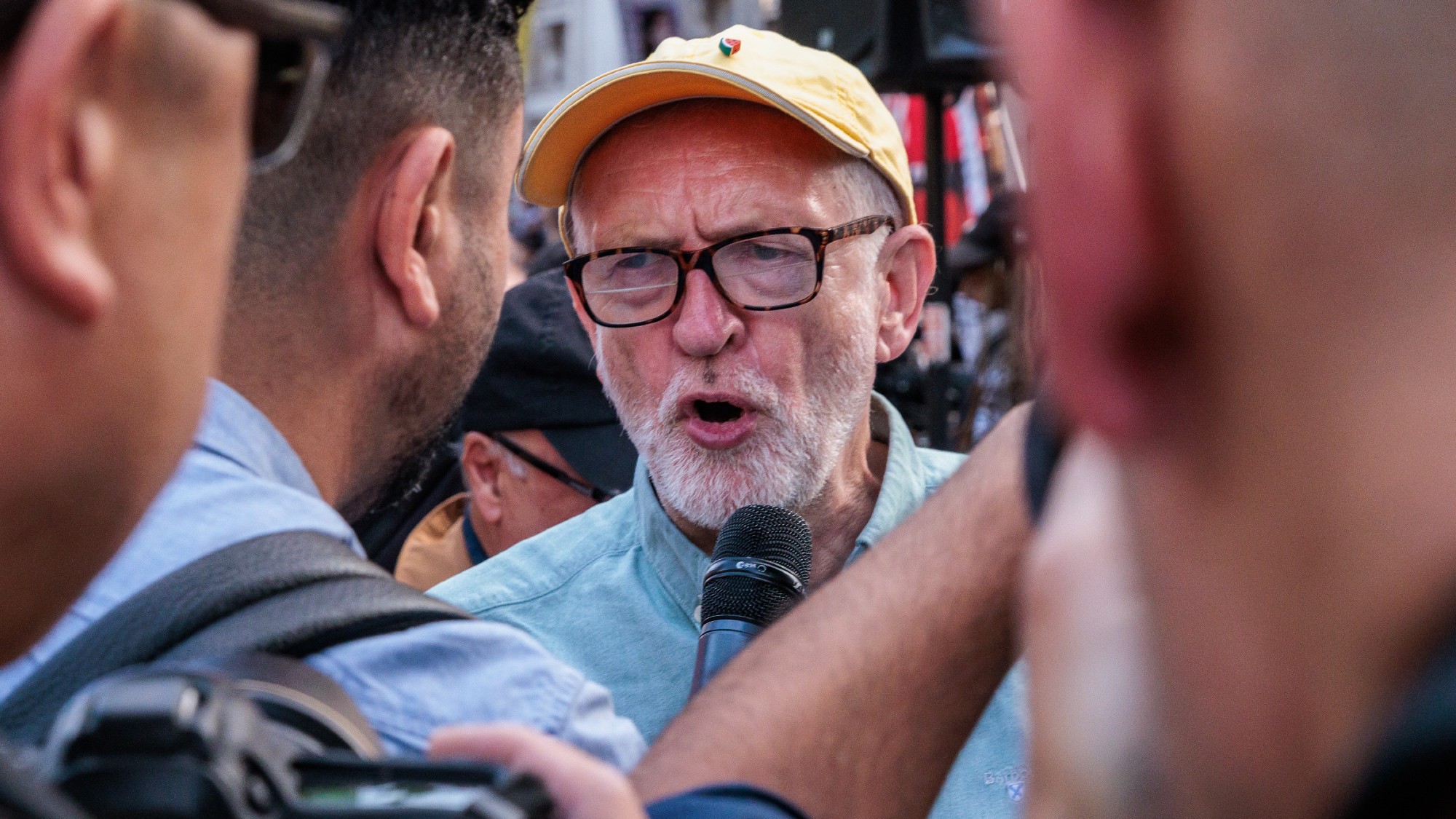Jeremy Corbyn speaks to journalists during a protest outside Downing Street to highlight the starvation of Palestinians in Gaza 