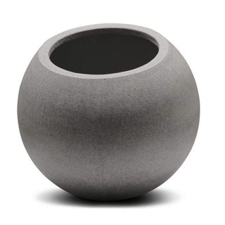 A round concrete plant pot